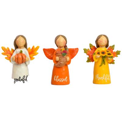 China Europe Hot Selling Custom Three Little Angel Figurine Polyresin Angel Statue Best Gifts For Family And Friends For Home Decoration for sale