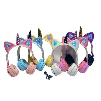 China 2021 new cute children's wireless headset mobile phone headphones unicorn cat ear bilateral stereo cartoon for sale