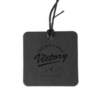 China Sustainable Custom Brand Paper Tags Thick Clothing Boutique Cardboard Hanger Tag Printing for sale