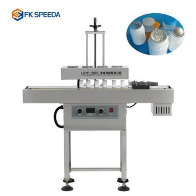 China Aluminum Cap Box Film Oil Electromagnetic Induction Aluminum Foil Lid Sealing Machine for sale