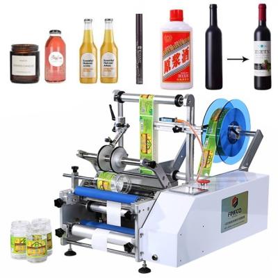 China Semi Automatic Industrial Vial Labeler Machine for Food Can and Round Bottle Labeling for sale