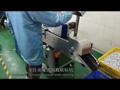 Horizontal automatic round bottle labeling machine