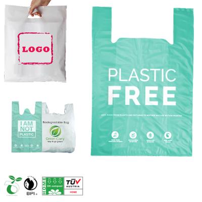 China Size 9x12 BIODEGRADABLE custom green supermarket bio grocery carry eco compostables biodegradable bolsas i am not plastic shopping t shirt bag for sale