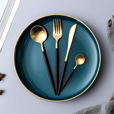 China Sustainable Retail Modern Cafe Restaurant Used Gold Black 4pcs Handle Design Flatware Cutlery Set for sale