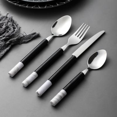 China Sustainable Modern Eco-Friendly Marble Design Stainless Steel Style Handle Plastic Black Flat Dinnerware for sale