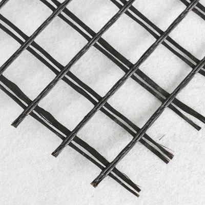 China Geogrid de fibra de vidrio de alta resistencia 30-150kN/M para mejorar la estabilidad de la pendiente en venta