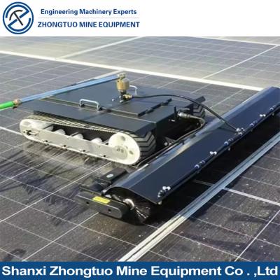 China Robô de limpeza de painéis fotovoltaicos de ponta Automático de secagem / lavagem sem água Robô de limpeza de painéis solares para panelas fotovoltaicas à venda