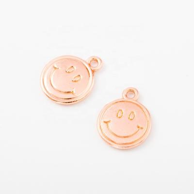 China Hot Selling Trendy Rose Gold Smile Face Pendant Charms For Fashion Jewelry for sale