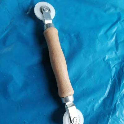 China Best Quality Industrial Screen Retainer Rolling Tool With Handle Groove Wood Roller For Window Screen Installation for sale