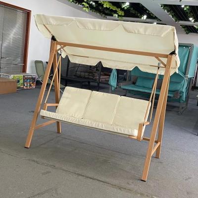 China Outdoor Three Person Seat Swing Chair with Metal Frame and Fabric Umbrella for sale