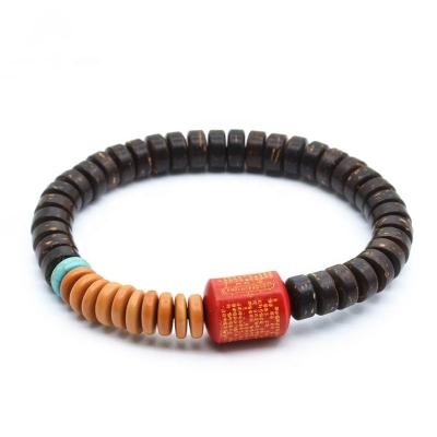 China Natural Stretch Mala Bracelet Tibetan Buddhism J1247 Coconut Wood Prayer Bracelet for sale