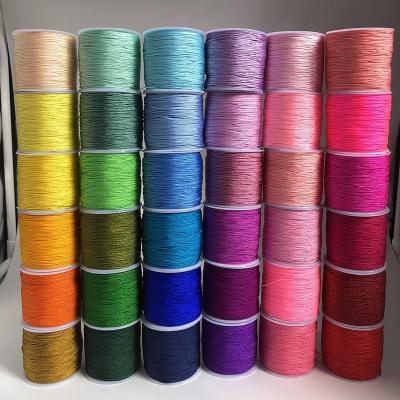 China Waterproof 50M/roll 0.8mm Nylon Thread Cord Chinese Knot Cord Bracelet Braided String Waxed Braided Nylon String for sale