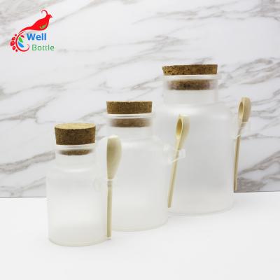 China Personal Care Empty Matte Cork Bottle 100ml 200ml 300ml 500ml Plastic Bath Salt Jar With Wooden Spoon PL-09A for sale