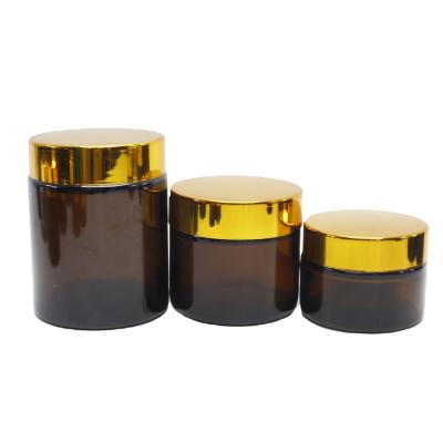 China 5g 10g 15g 20g 30g 50g 100g Cosmetic Cosmetic Packaging Amber Glass Jar With Gold Lid GJ-AN17 for sale