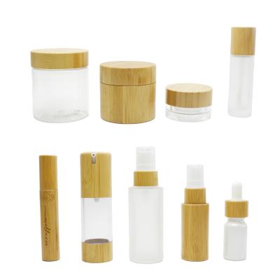 China Personal Care Packaging 30ml 50ml 100ml 120ml 150ml Bamboo Cosmetic Glass Bottles And Jars With Bamboo Spray Lotion Lid BP-888AN for sale