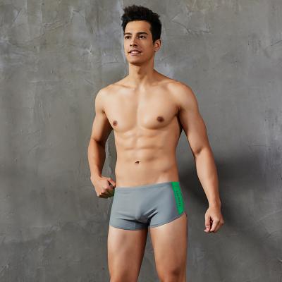 China Quick Dry Logo Mens Swimming Trunks Customized by Soandex Breathable Soft Nylon for sale