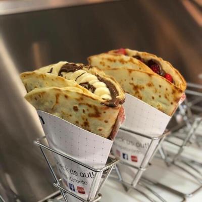 China Food Grade Triangle Ice Cream Pizza Wrapper Food Bubble Waffle Holder Pancake Egg Waffle Holder Recyclable Paper Hot Cone for sale