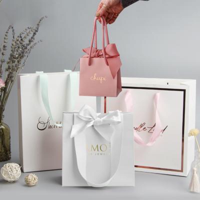 China China Recyclable Competitive Price Brand Logo Luxury Wine Boutique Shopping Elegant Customized White Paper Gift Bags With Ribbon Handles for sale