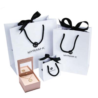 China Custom Logo Printed Hair Wig Packaging Gift Small Jewelry Retail Recyclable White Retail Carrier Gift Shopping Paper Bag With Handle for sale