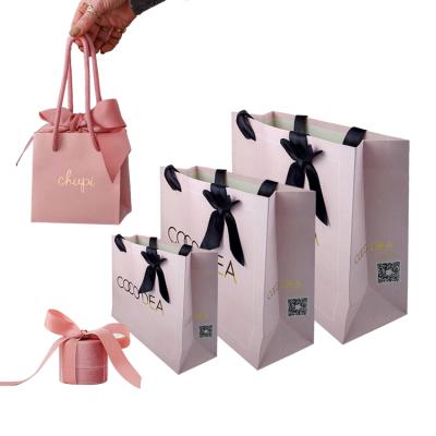 China Recyclable Wholesale Luxury Custom Printing Small White Shopping Kraft Gift Paper Bag With Your Own Logo for sale