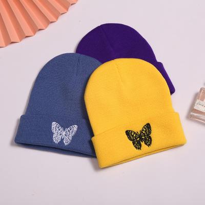 China Wool butterfly trend COMMON embroidery solid color warm and fashionable hat for sale