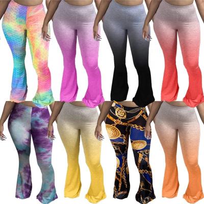 China Anti-pilling S-4XL plus size change ladies high waisted gaiters 2021 solid color progressive women stacked pants gaiters flare pants for sale