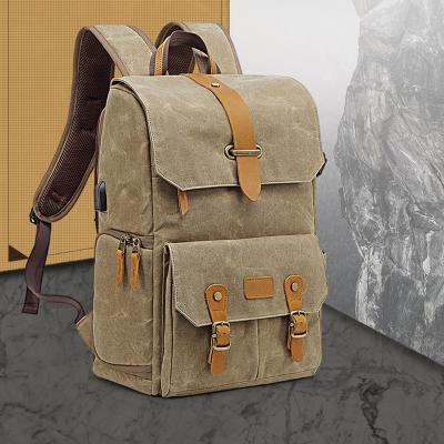 China With USB hot new style for men and women comes with USB canvas camera bag SLR camera backpack for sale