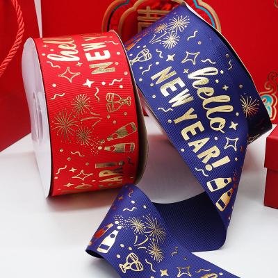 China High tenacity golden polyester ribbon gift box wrapping ribbon customization 2.5cm Christmas yarn ribbon for sale