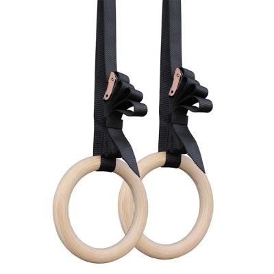 China Crossfitexercise; fit force out cross pull up wooden gymnastic rings with nylon straps for sale