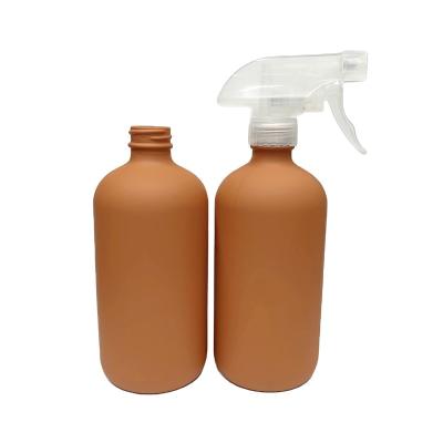 China 500ml 16oz Chemical Orange Color Rubberized Treatment Spray Glass Bottle for sale