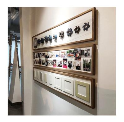 China Eco-Freindly Combination Long Combination Exhibition Hall Article Display Wall Frame Wooden Photo Frame for sale