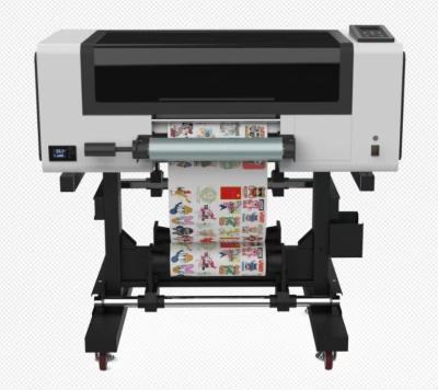 China Digitaler UV-DTF-Drucker automatischer 30 cm-DTF-Drucker mit Dauerfarbsystem zu verkaufen