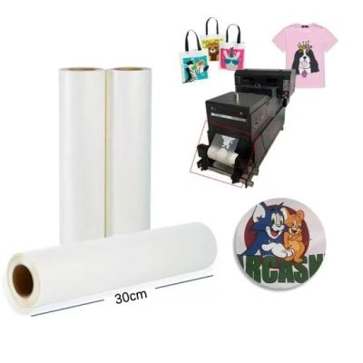 China Zoek het perfecte matte DTF-afdrukmateriaal 30cm 60cm Dtf Transfer Pet Film Roll Paper Single Film Roll Dtf Pet Film Te koop