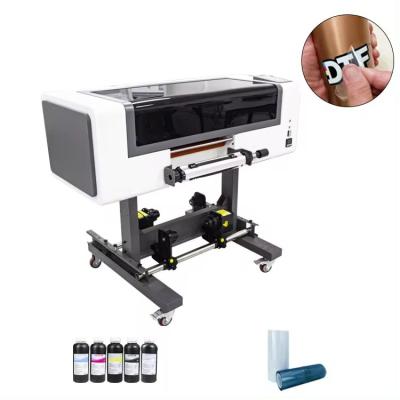 China AB Film Medien 30cm UV DTF Drucker Automatischer UV Roll Drucker mit CMYK LC LM W Verschwinden zu verkaufen