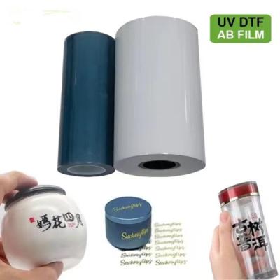 China UV DTF Film Package A*100m+B*100m Film 0.6*100m for Roll UV Printer Label Sticker UV DTF AB Films for sale