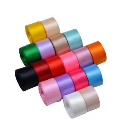 China Polyester Ribest Customized 196 Colors Single Faced Polyester Satin Ribbon For Gift Wrapping Wholesale Roll for sale