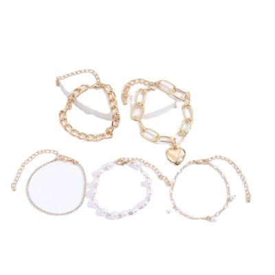 China New lower price fashion OL bracelet 5 piece popular multilayer gold plated bead pearl love geometric hollow round bracelet for sale