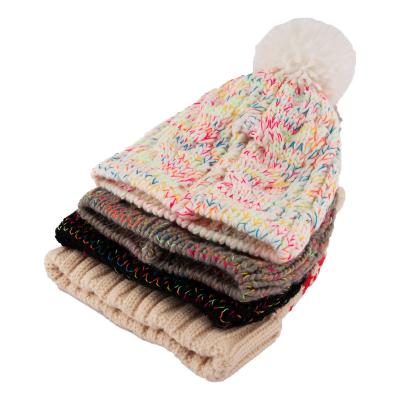 China Custom Fashional JOINT Acrylic Warm Hat Cuffed Winter Knit Beanie With Pom Pom for sale