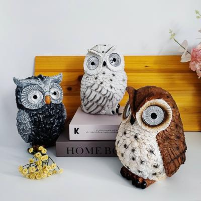 China World Hot Selling Home Decor Sculpture Resin LED Eye Owl Figurine For Garden Decor for sale