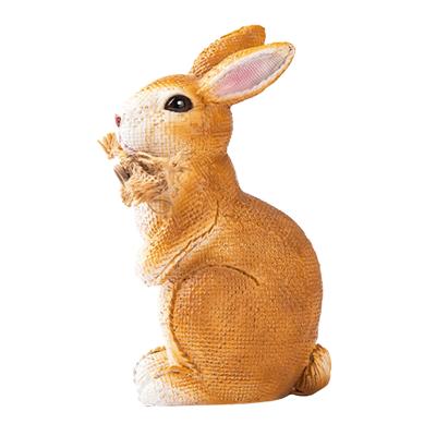 China New World American Brown Resin Cartoon Country Sitting Rabbit With Ribbon Figurines Garden Decor for sale