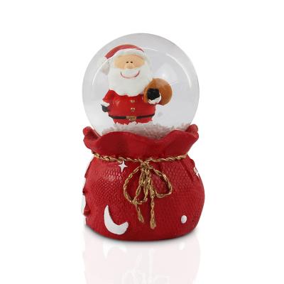 China Cute Santa Claus Snow Globes Traditional Red Snowballs for Table Desk Interior Home Decoration for sale