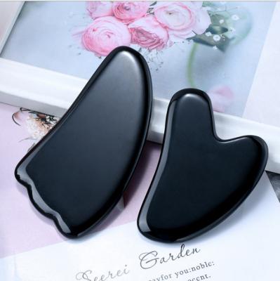 China Natural Stone Facial Tool Gua Sha Black Obsidian Face Massager Hematite Gua Sha Logo Customized for sale