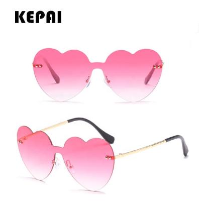 China Fashion Rimless Design Sun Glasses Women Heart Shaped Sun Glasses Europe Fashion Sun Glasses 2018 Latest for sale