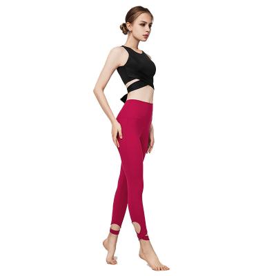 China Antibacterial high quality solid color back hollow out sports bra and gaiters peel tight yoga set for women for sale