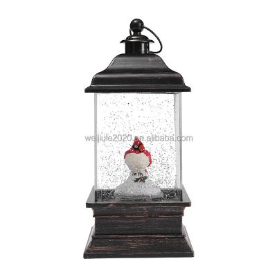 China Decoration Light 2022 New Product Resin Crafts Water Little Bird Indoor Table Lamp Snow Led Religious Wind Lantern For Decoration for sale