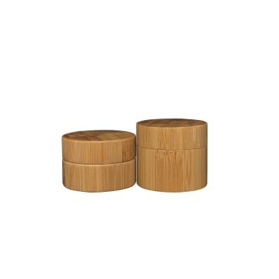 China Round shape pp promotion jar 15g bamboo plastic jar eco-friendly natural plastic lid bamboo cosmetic jars for sale