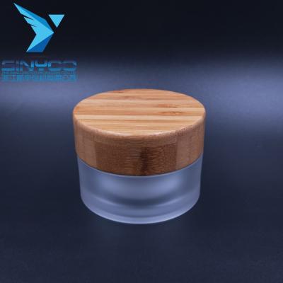 China 2020 Cosmetic Bamboo Acrylic Bamboo Cream Jar Empty Lid Plastic Jar for sale