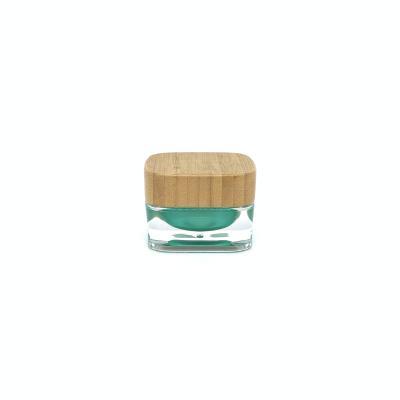 China New Unique Style Skin Care Square Acrylic Jar With Bamboo Wooden Lid for sale