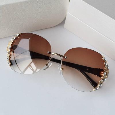 China 2022 Hot Sale Vintage Diamond Sunglasses Women Luxury Fashion Sun Rimless Glasses UV400 for sale