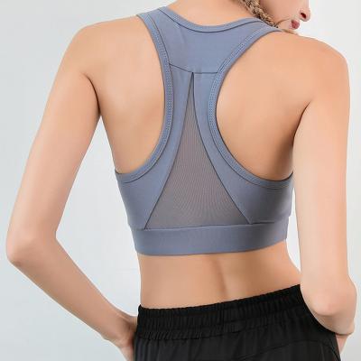 China Fashionable Top Selling Raceback Polyester Padded Breathable Training Mesh Yoga Bra for sale